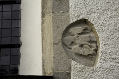 Relief från tidigare kyrka